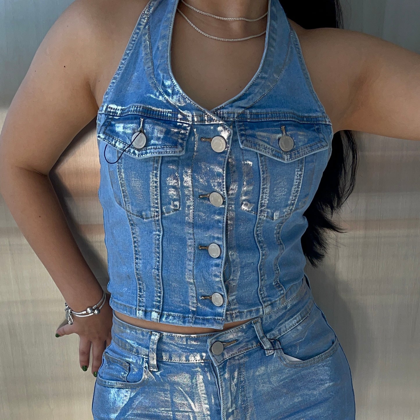 Vest with metallic foil