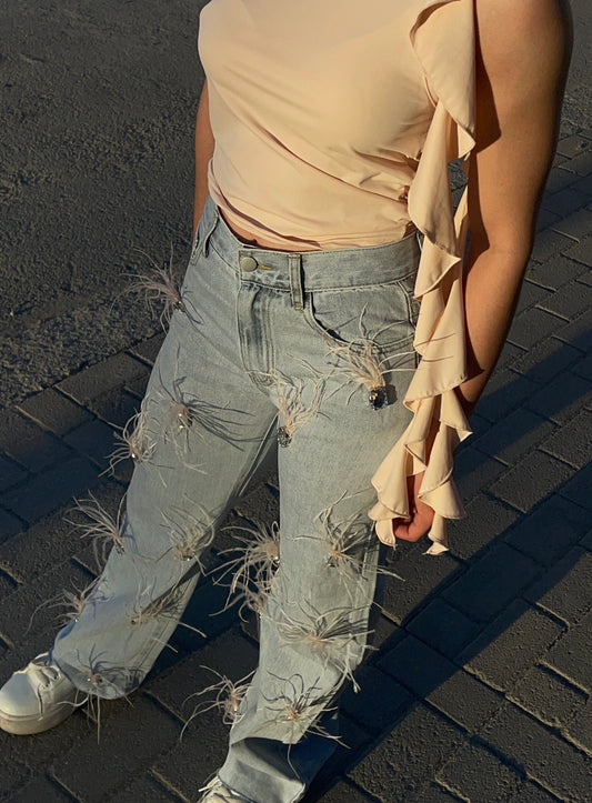 Pantalón con plumas en estoperol